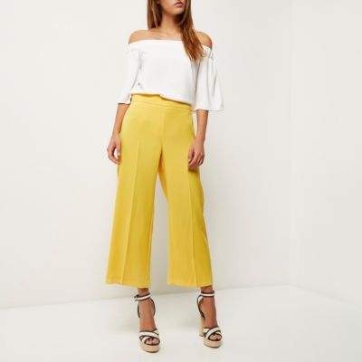 Yellow cropped wide leg trousers